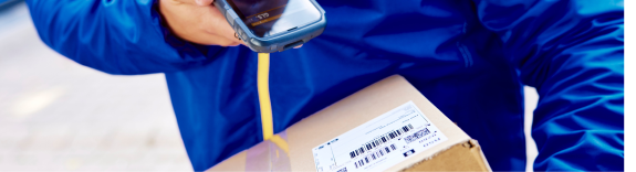 Delivery driver scanning a GLS box